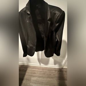 Trendy shimmering black women’s jacket